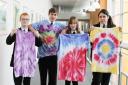 DOING THE BUSINESS: Education Village pupils, from left Jordan Denham, 15, Ben Simpson, 14, Louise Spence, 15, and Roxanna Arif, 14, take part in the Foundation for Jobs’ Apprentice-style challenge