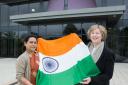 Swrma Mishra, principal of Dayanard Public School, and Catherine McCoy, principal of St Aidan's, with the Indian flag.
