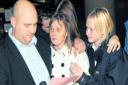 END OF AN ORDEAL: Suzanne Holdsworth with partner Lee Spencer and daughter Jamie-Lee, outside Teesside Crown Court