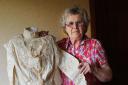 FAMILY HEIRLOOM: June Luckhurst, from Ingleton, with the 1909 wedding dress which is going into an exhibition.