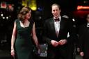 The Duke of Cambridge accompanied by Amanda Berry OBE, Chief Executive of Bafta arriving at The EE British Academy Film Awards 2014, at the Royal Opera House, Bow Street, London