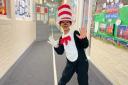 A student at Cheam Common Junior Academy in Surrey dressed as The Cat in the Hat (PA)