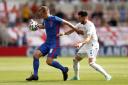 James Ward-Prowse holds off his opponent during England's win