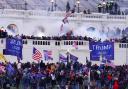 Rioters appear at the US Capitol on January 6, 2021, in Washington (John Minchillo/AP, File)
