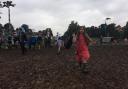 A young festival-goer walks near the main stage at the Deer Shed Festival 2019