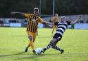 Darlington's Will Hatfield makes a tackle on Saturday against Boston United. Picture: CHRIS BOOTH