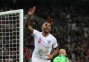 Callum Wilson celebrates after scoring on his international debut against the United States