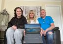 A window on the world, Julie and Keith Purvis with their daughter Jade, left, whose life has been transformed by a laptop donated by Durham County Carers Support