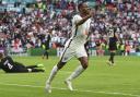 Raheem Sterling celebrates after scoring England's opening goal in their 2-0 win over Germany Picture: ANDY RAIN/AP