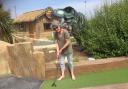 Mrs B on her way to victory at crazy golf on the Isle of Wight