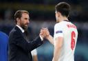 Gareth Southgate congratulates Harry Maguire after England's quarter-final victory over Ukraine Picture: NICK POTTS/PA