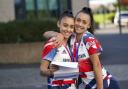 Olympic medal winning twins Jessica, left, and Jennifer Gadirova celebrate their GCSE results at Aylesbury Vale Academy in Buckinghamshire