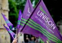 Unison flags during a strike in 2014, PA image.