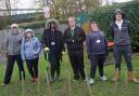 Next Steps students at Darlington College plant trees to improve the environment