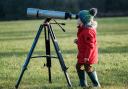 Samuel Startup, aged four,  looks to the skies at Adderstone Field in Dalby Forest as Forestry England launch a schools competition to design an observatory Picture: Tony Bartholomew