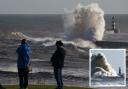 People watch as waves crash against the lighthouse in Seaham Harbour, County Durham.  Pictures: PA MEDIA.