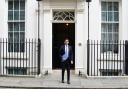 Rishi Sunak on Downing Street with the Spring Statement. Credit: PA