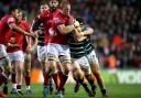 Newcastle Falcons' Philip van der Walt tackles Leicester Tigers' Ollie Chessum