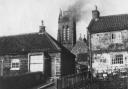 The burning church tower from Marske High Street 120 years ago