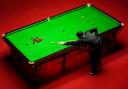 England's Ronnie O'Sullivan in action against England's Judd Trump during day sixteen of the Betfred World Snooker Championship at The Crucible, Sheffield. Picture date: Sunday May 1, 2022.