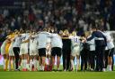 England's players and staff form a huddle after their semi-final win over Spain at Women's Euro 2022. Picture: ADAM DAVY/PA