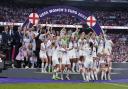 Watch the moment England team gatecrash Sarina Wegman's press conference after Euro's win (PA)