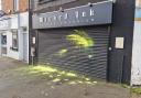 A Darlington tattoo parlour was covered in paint last weekend after vandals allegedly defaced the store Credit: MICHAEL ROBINSON