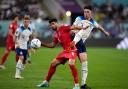 Declan Rice challenges Mehdi Taremi during England's 6-2 win over Iran on Monday