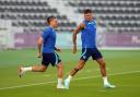 England's Ben White and Kalvin Phillips during a training session at the Al Wakrah Sports Club before the Arsenal defender's World Cup exit