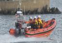 Hartlepool RNLI inshore lifeboat and volunteer crew heading out to sea to assist with the incident at the North Gare.