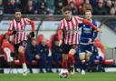 Trai Hume dribbles forward during Sunderland's win over Middlesbrough