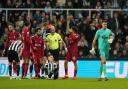 Nick Pope is sent off during Newcastle's game with Liverpool