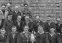 EPIC SPOILS: Crook Town captain, Bobby Davison, showing the FA Amateur Cup off to his workmates at Marshall Richards Machine Company