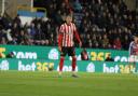Dan Neil was part of the Sunderland side that claimed a goalless draw against Burnley at Turf Moor on Friday night