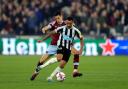 Callum Wilson holds off Nayef Aguerd during Newcastle's 5-1 win over West Ham
