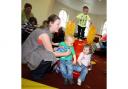 PHOENIX RISES: The parent and toddler group in their new home.