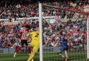 Trai Hume heads home his first Sunderland goal against Birmingham City