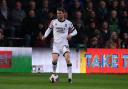 Jonny Howson strolls out with the ball during Middlesbrough's defeat at Luton Town