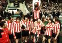 Sunderland's players celebrate with the FA Cup in the wake of their Wembley triumph over Leeds United