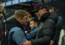 Newcastle United head coach Eddie Howe and Liverpool boss Jurgen Klopp