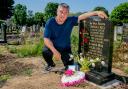 Tom Bell at the grave of his mam Hilda and dad Thomas after discovering last year that his father had been buried in the wrong place for 17 years. A gravestone has finally been erected in memorial to the couple who are now buried together,