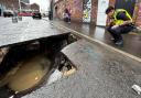 A huge sinkhole has suddenly appeared in the middle of a road leaving residents shocked.