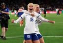 England's Chloe Kelly and Alex Greenwood celebrate victory following a penalty shoot-out victory over Nigeria