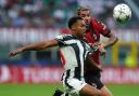 Jacob Murphy battles with Theo Hernandez during Newcastle United's goalless draw with AC Milan