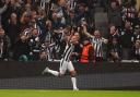 Sean Longstaff celebrates after scoring in Newcastle United's win over Paris St Germain