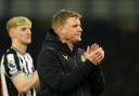 Eddie Howe applauds the Newcastle United fans after his side's defeat at Everton