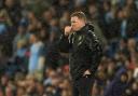 Eddie Howe watches on through the rain during Newcastle's 2-0 defeat at Man City