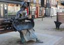 The sculpture of Old Mother Shipton in Knaresborough market place, who was said to have been born in a  nearby cave and became famous in her own lifetime for her many predictions