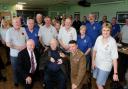 Ron Starling is presented with his Nuclear Test Medal by Lt Col John Henry surrounded by fellow veterans at Bishop Auckland Veterans  Group