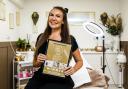 Becki Cooper with her certificate at Becki C's Nails, Beauty, Aesthetics in Darlington. 26.11.2025.  Photograph: Stuart Boulton/The Northern Echo